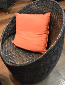 Chair and orange cushion